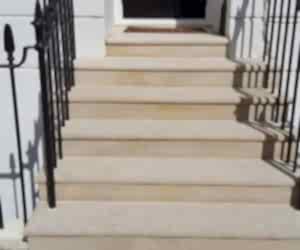 washing of stone steps in London, after photo